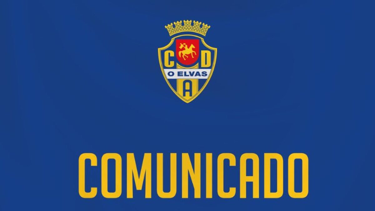 Logótipo do clube CAD Ixelles 'O Elvas' sobre fundo azul, com a palavra 'COMUNICADO' em letras amarelas por baixo.